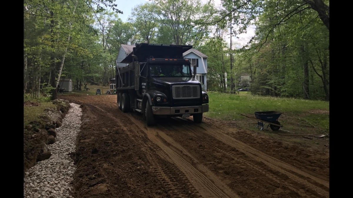 Drainage and excavation work on a paving project site