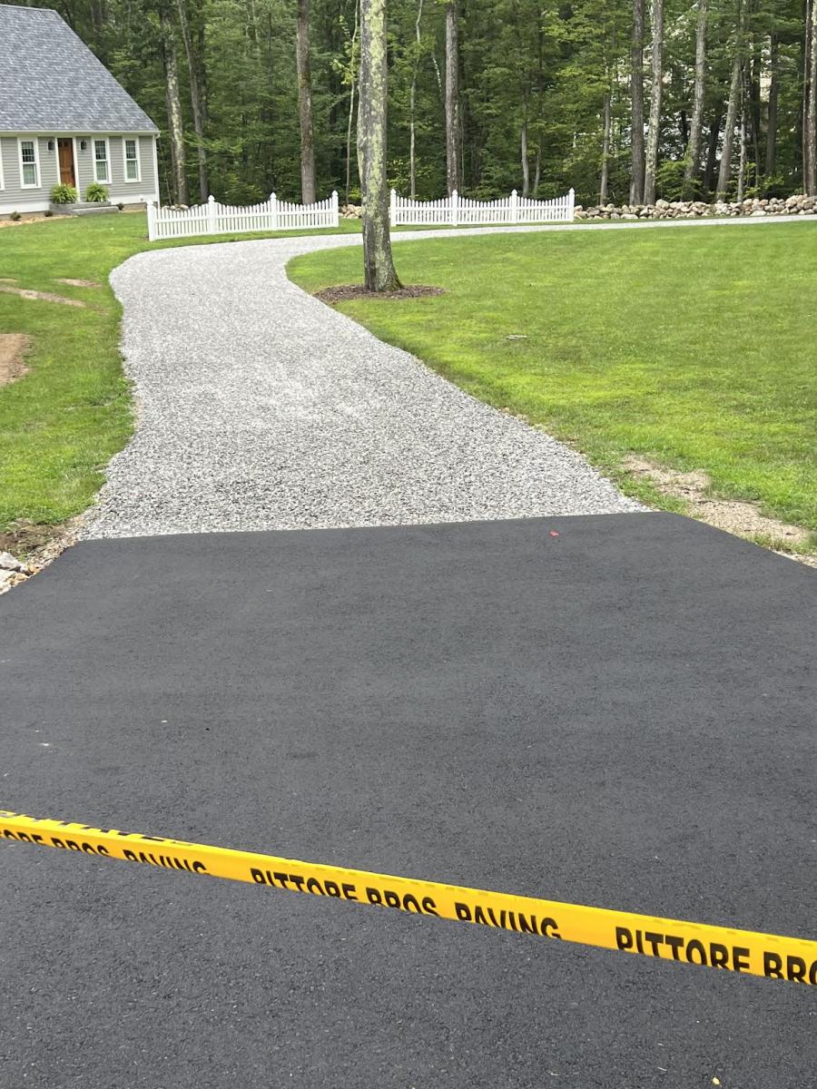 Gravel driveway prepared for new asphalt paving