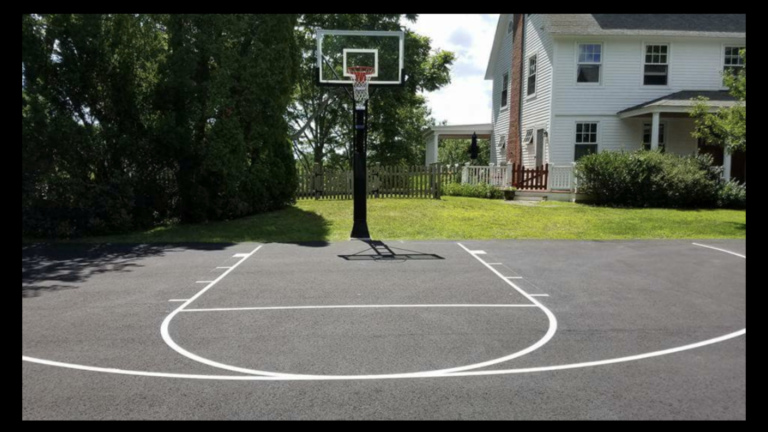 Line striping painted on a newly paved basketball court