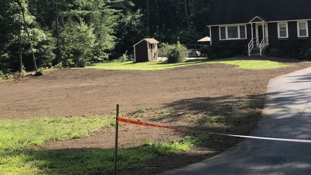 Screened loam delivery for a landscaping and grading project