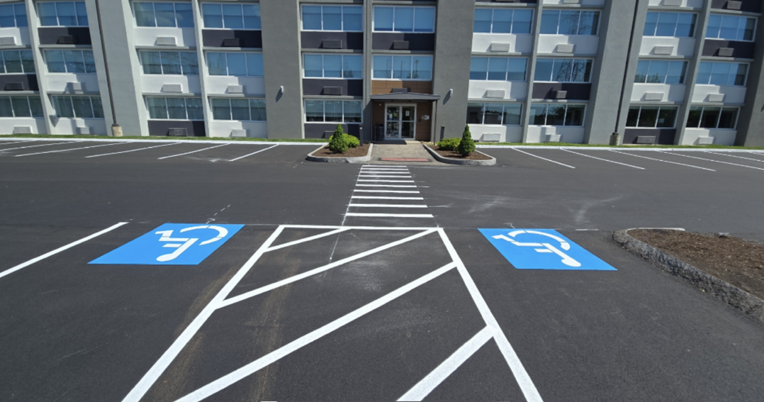 Wide residential driveway newly paved by Pittore Brothers