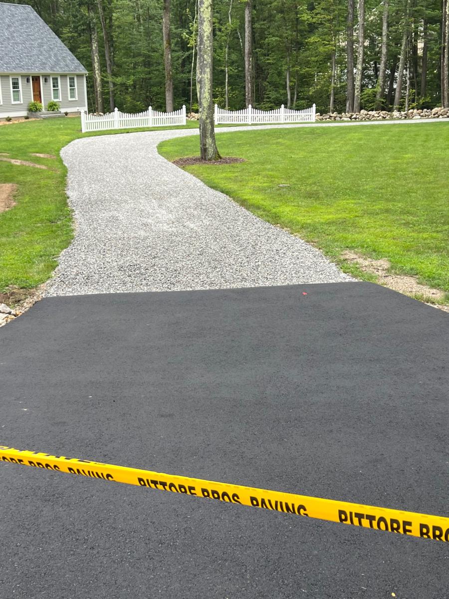 Fresh asphalt surface on a completed paving project